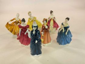 ROYAL DOULTON; a group of seven figures comprising 'Adrienne' HN2304, 'Julia' HN2705, 'Kirsty'