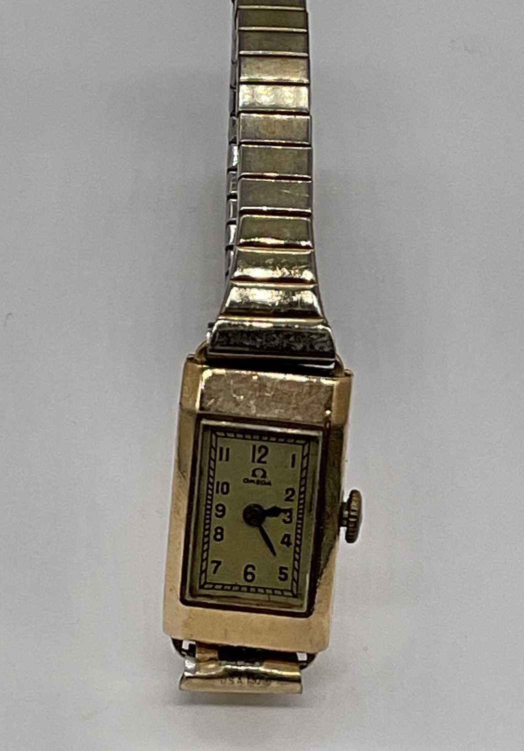 OMEGA; a vintage 9ct gold cased lady's wristwatch with Arabic numerals to the rectangular dial, also - Image 3 of 7