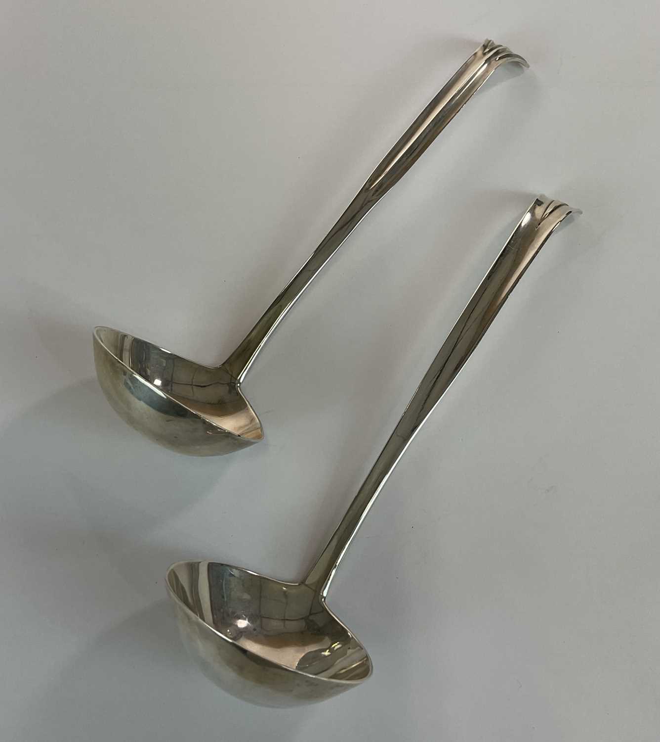 A pair of Elizabeth II hallmarked silver sauce ladles, Sheffield, 1990, length 18.5cm, combined