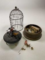 An automaton singing musical birdcage for restoration, currently in kit form.