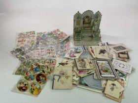 A collection of Victorian and later greetings cards, also with mid century scraps.