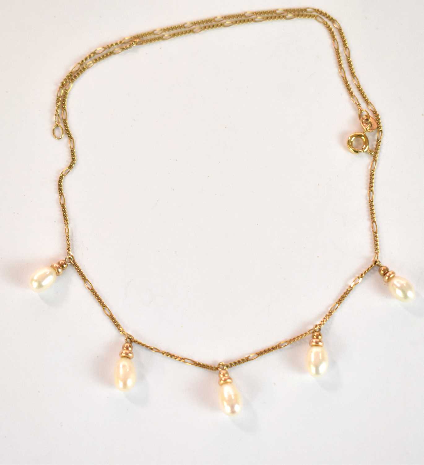 A 9ct yellow gold necklace set with five oval pearl drops, length 38cm, approx. 3.15g. - Image 2 of 3