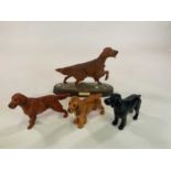 ROYAL DOULTON AND BESWICK; a dog figures includes a setter, height 23cm, and black spaniel, and