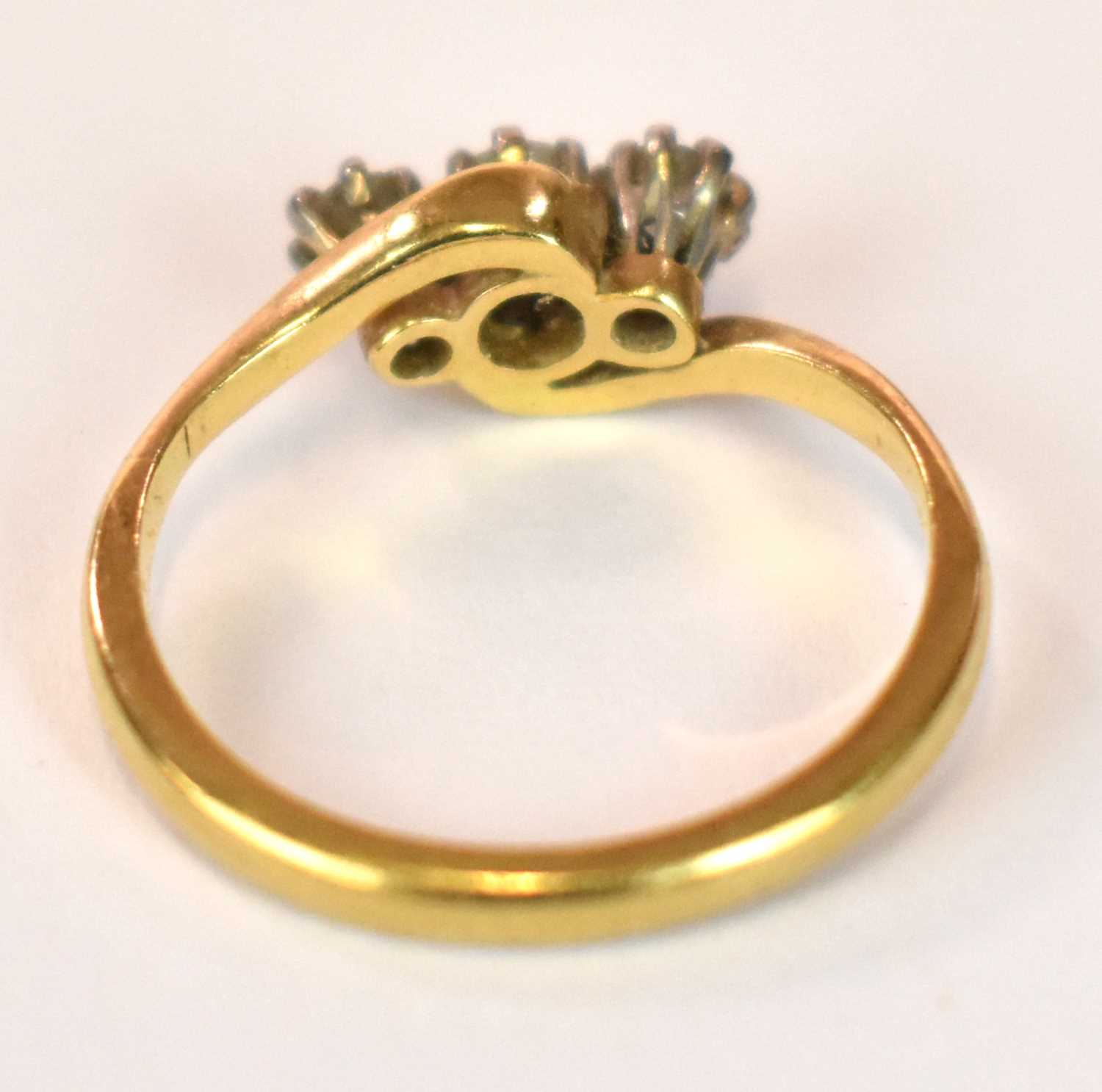 An 18ct yellow gold platinum tipped three stone diamond ring in swept setting, size J, approx. 3g. - Image 7 of 7