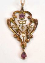 A 9ct yellow gold Edwardian Art Nouveau seed pearl pierced pendant, supported on a fine link