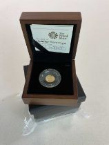 Two encapsulated Elizabeth II limited edition Royal Mint 2009 quarter sovereigns, one numbered 3353,