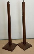 A pair of wooden Art Deco floor lamps on square base with tapered shaft, height 145cm.
