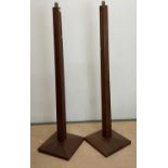 A pair of wooden Art Deco floor lamps on square base with tapered shaft, height 145cm.