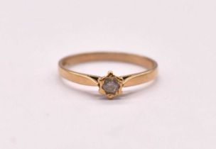 An 18ct yellow gold diamond solitaire ring, the collet set stone weighing approx. 0.20cts, size N