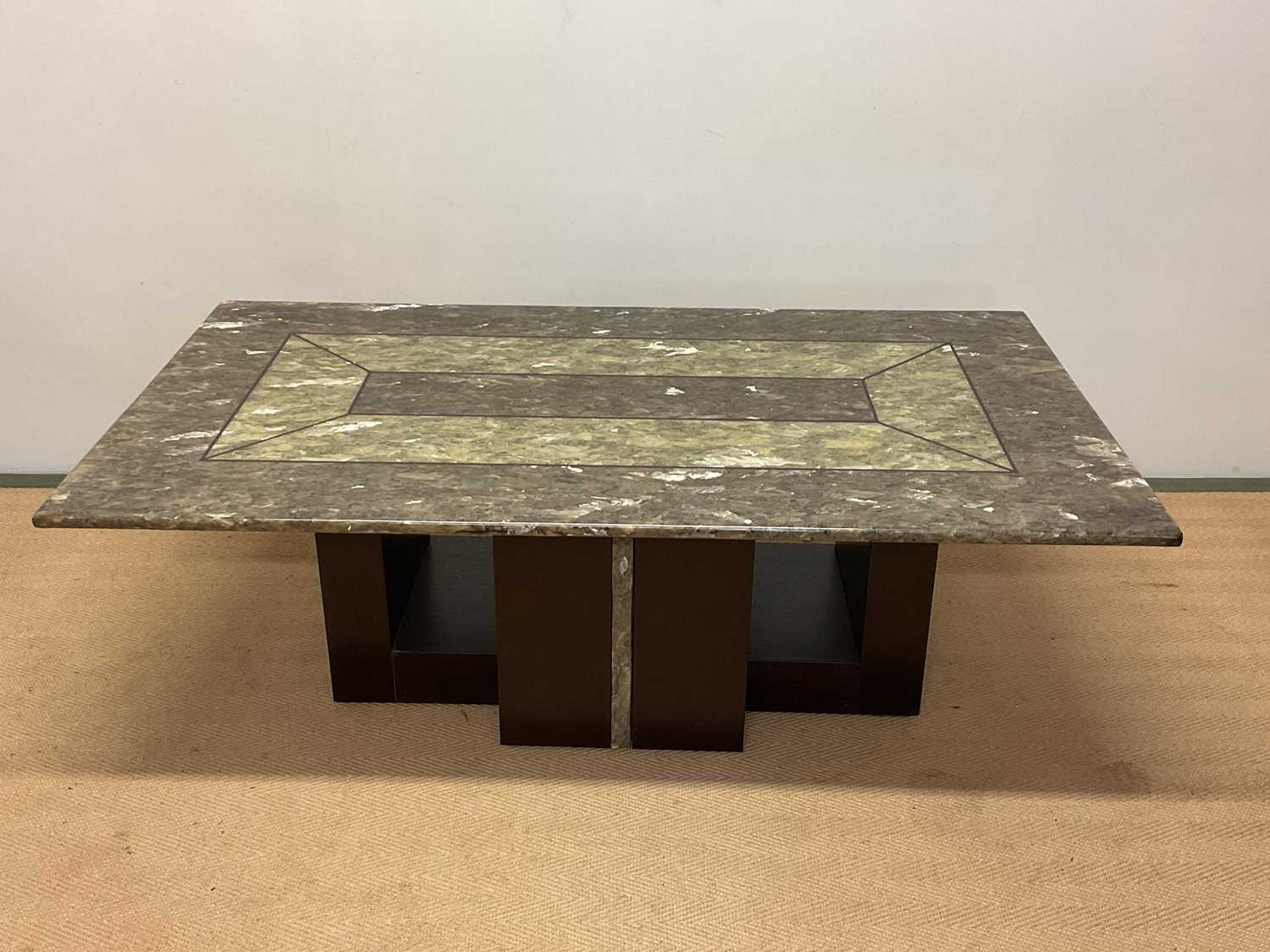 A late 20th century Italian green marble topped coffee table with a dark stained wooden base and