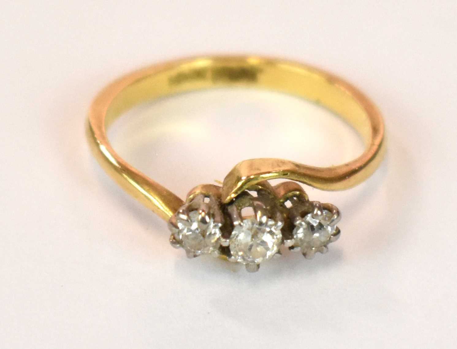 An 18ct yellow gold platinum tipped three stone diamond ring in swept setting, size J, approx. 3g. - Image 5 of 7