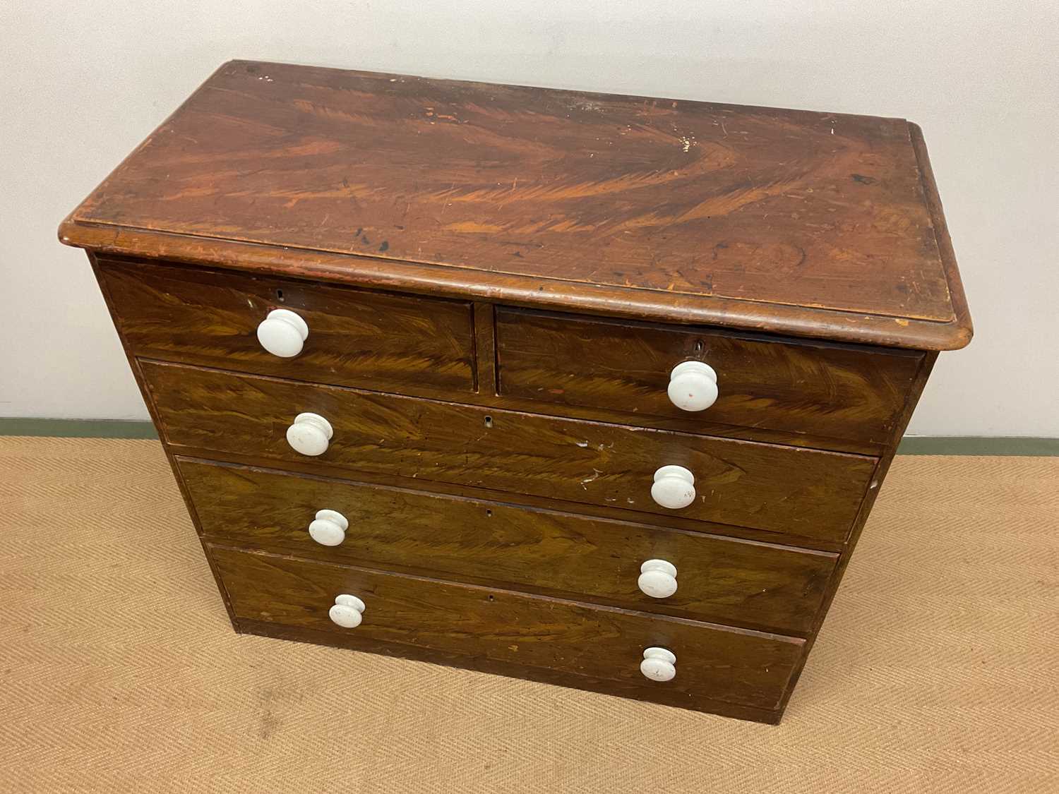 A 19th century scumbled pine chest of drawers, with two short and three long drawers, with ceramic - Image 2 of 3