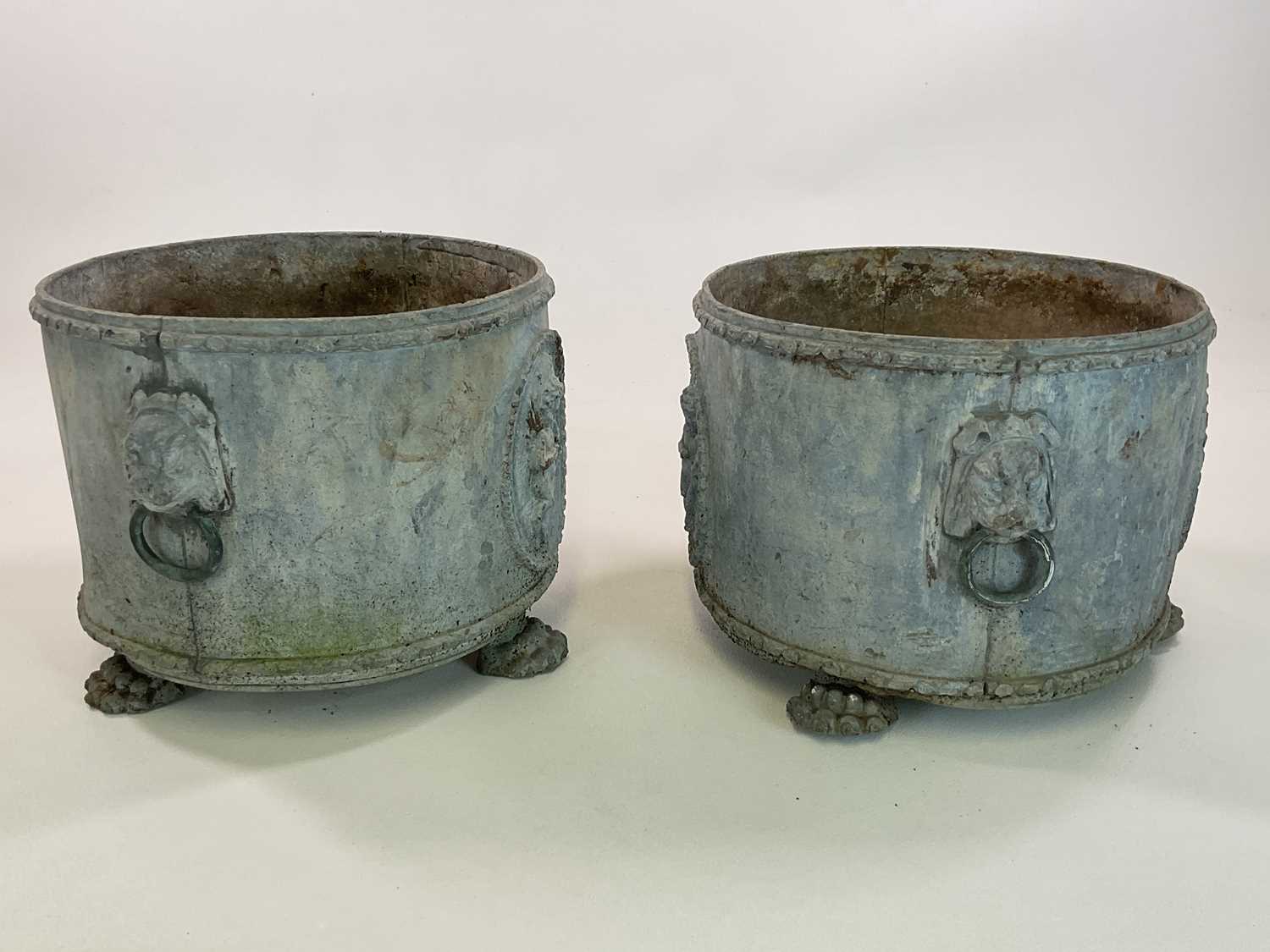 A pair of Georgian style lead planters of circular form with lion mask and ring mounts along with - Image 3 of 3