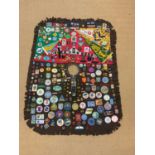 A double sided blanket of over three hundred Girl Guide badges, with the majority sewn on to include