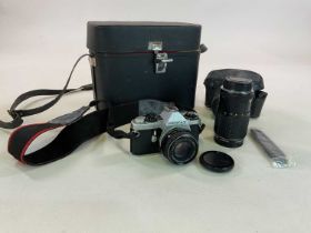 A Pentax ME, with an Ashai lens, in carry case