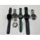 A group of six watches including a Seiko solar chronograph with date aperture, a Casio, a Sekonda,