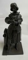 A patinated bronze model of 'Jeanne d Arc' (Joan of Arc) standing clutching a sword, height 32cm.