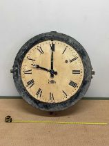 GENTS OF LEICESTER; an industrial wall clock with metal frame and enamel dial, set with Roman