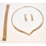 A suite of 9ct three tone jewellery comprising necklet, bracelet, and pair of earrings, the bracelet
