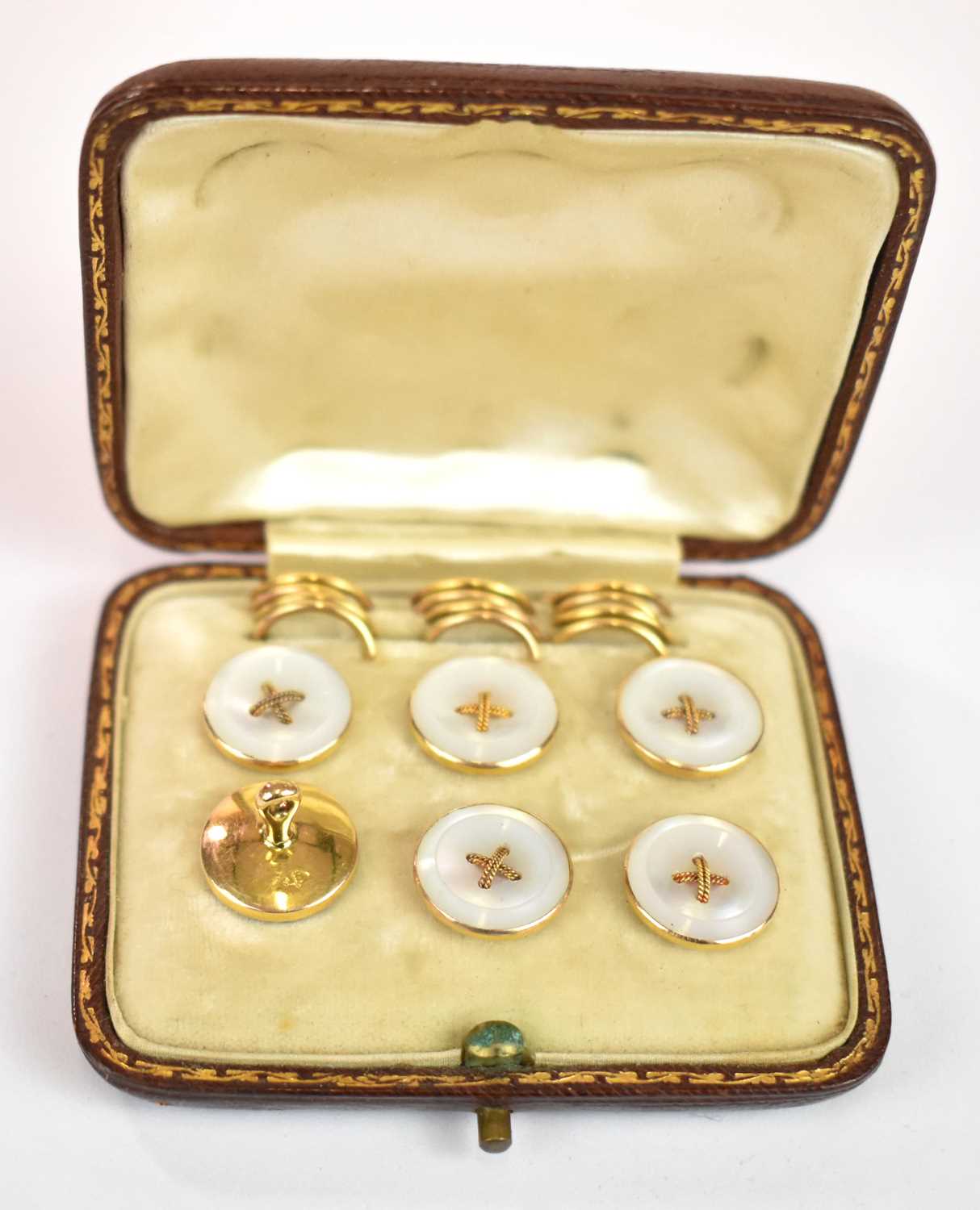 A cased set of six Edwardian 15ct yellow gold button studs with mother of pearl faces, complete with - Image 2 of 3