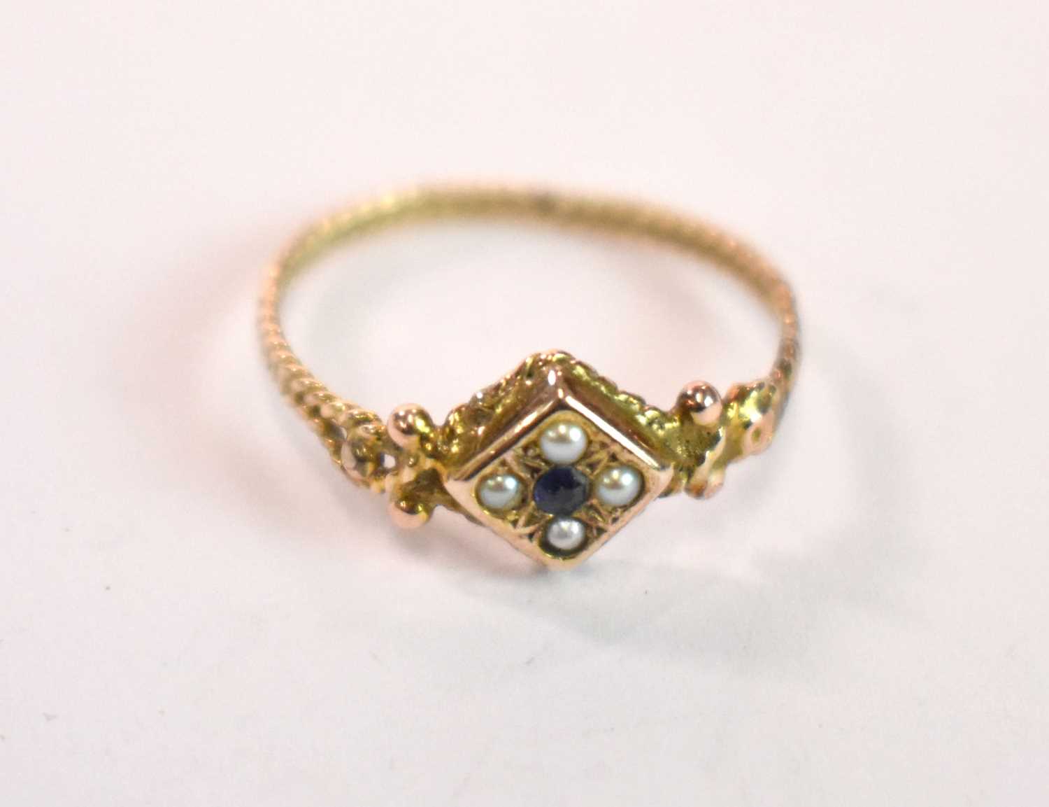 A 9ct yellow gold seed pearl and sapphire ring, size M, approx. 1.1g.