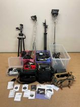 A large quantity of cameras, lenses and other accessories, predominantly Canon items.