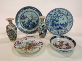 A quantity of Chinese and Japanese ceramics, comprising vases, plates and a dish, height of vases