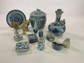 A group of Chinese blue and white ceramics, including a 17th century kendi (badly damaged), an