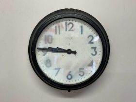 SMITHS; a mid 20th century Sectric industrial wall clock, with metal and glazed case, the dial