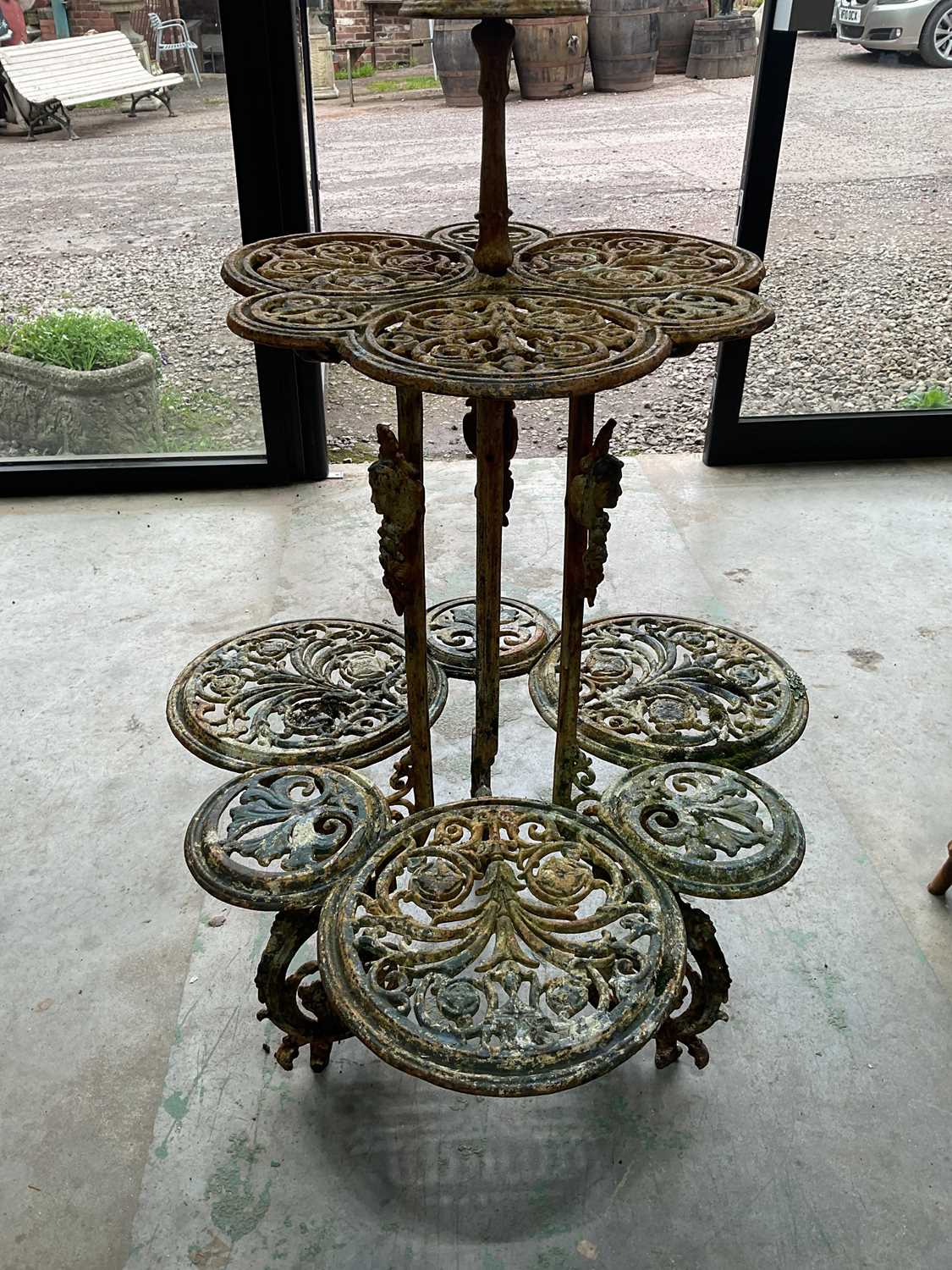 A cast iron painted plant stand, height 118cm, diameter 80cm. Condition Report: General integrity of - Image 3 of 6