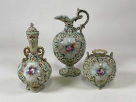 Three pieces of Japanese porcelain comprising a ewer, twin handled globular vase and a tall vase and