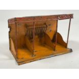 ATTRIBUTED TO ROCK & GRANER; an early German tin plate stable with orange detail inside and red