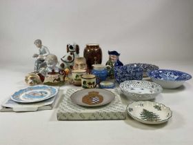 A quantity of decorative ceramics, including a Minton brown glazed vase, mottoware, character jug,