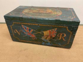 A large painted pine seaman's chest decorated with a masted vessel to the hinged lid, flags and VR