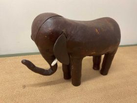 LIBERTY OF LONDON; a rare early 20th century original leather footstool modelled as an elephant,