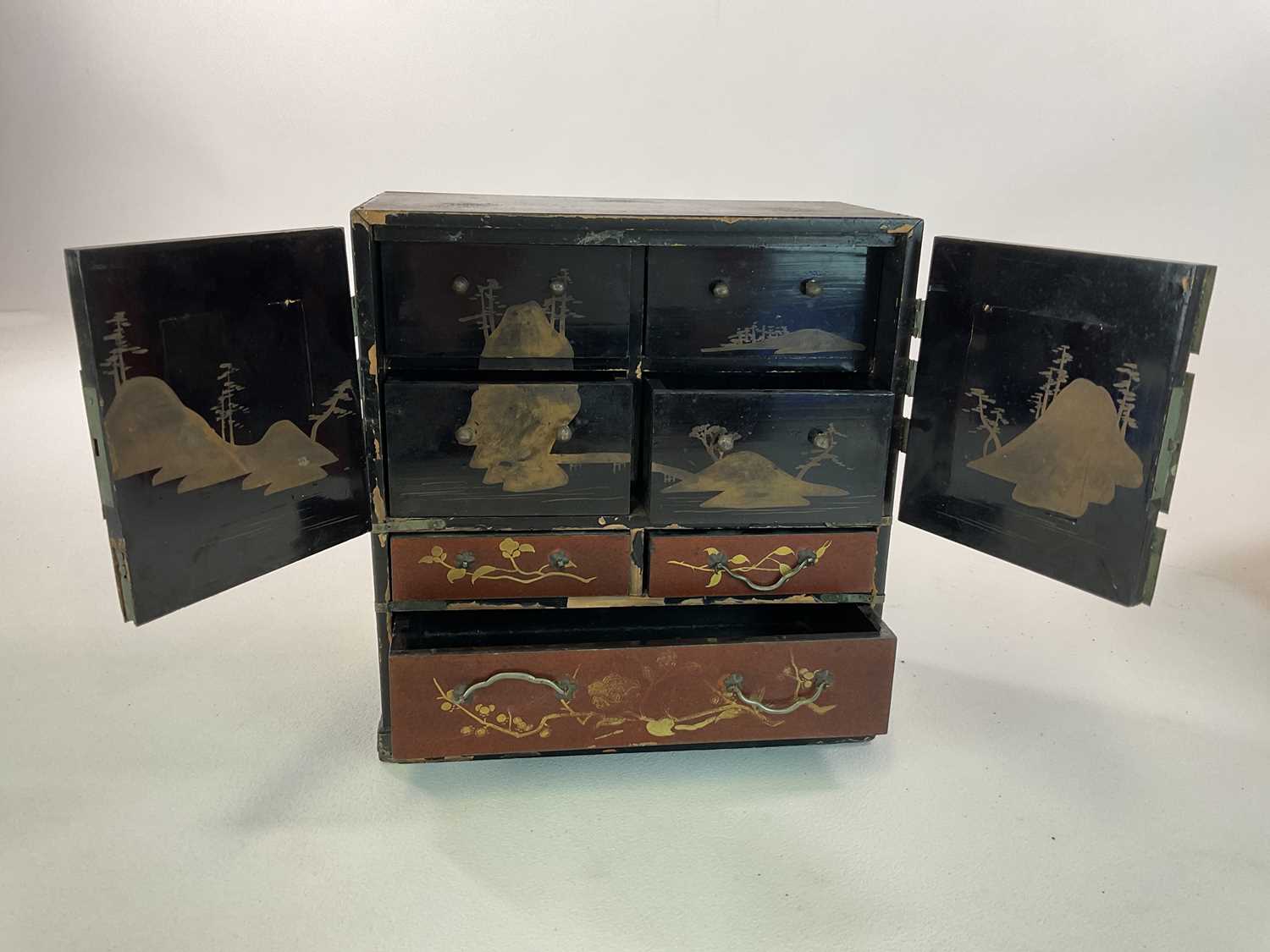 A Chinese lacquered table top cabinet with painted and gilt decoration of birds and flowers and - Image 3 of 5