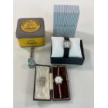 Three boxed wristwatches, comprising Fossil, Nivada, and Tommy Hilfiger (3)