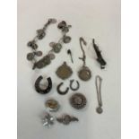 A quantity of silver jewellery, some pieces relating to horses and hunting, also a silver chain