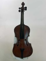 An unusual mid 20th century stitched leather violin, labelled to the interior, 'Made by T. M.
