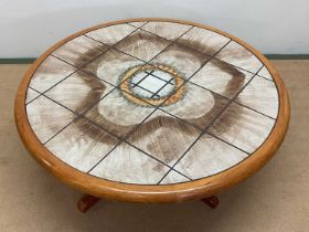 H M SOFABORDE; a 1970s Danish teak circular tile top coffee table raised on four splayed supports,