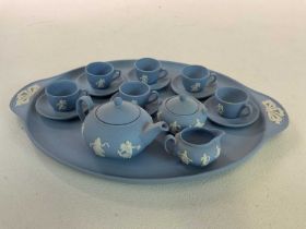 WEDGWOOD; a miniature jasperware teaset, 'Dancing Hours', to include teapot, jug, sugar bowl, six