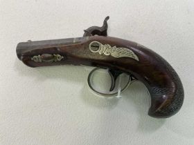 HENRY DERINGER; an original pocket pistol with adzed walnut stock, engraved metalware and signed