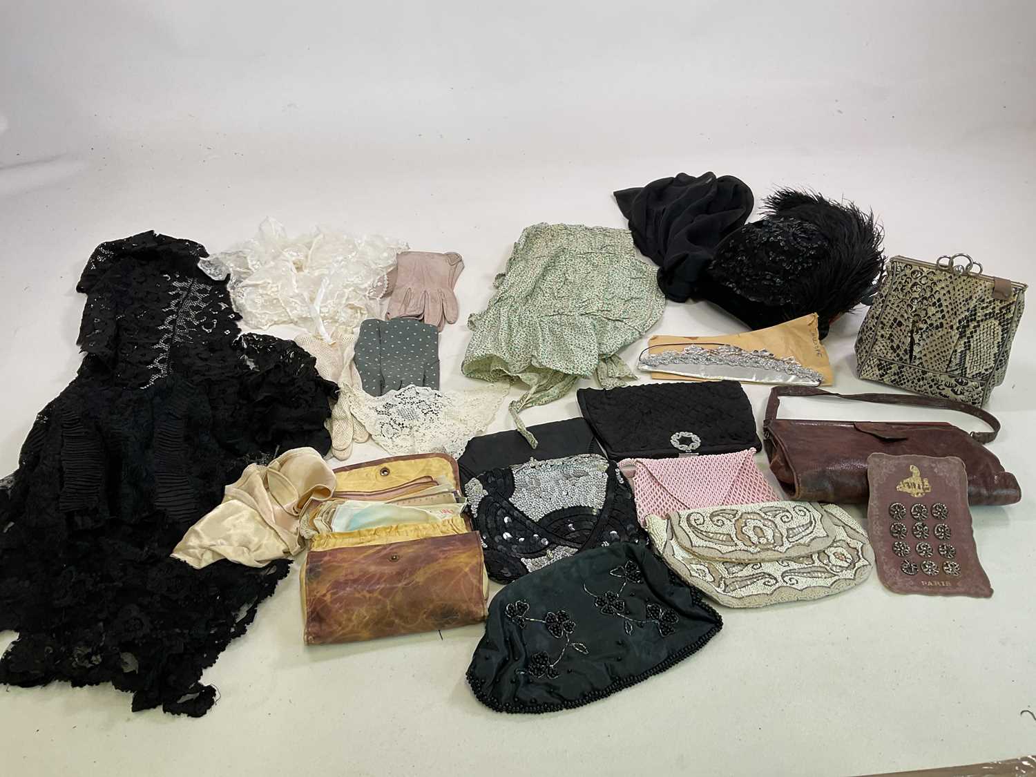 A collection of vintage accessories including beaded evening and other bags circa 1930 and later,