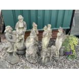 A group of classically inspired composite stone garden statuary, tallest 82cm