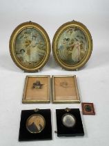 A pair of Georgian oval silk work embroideries in gilt frames, with two miniatures, a