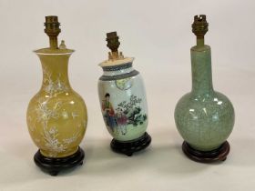 Three Oriental lampbases comprising a celadon style crackle glazed example, a decorative yellow