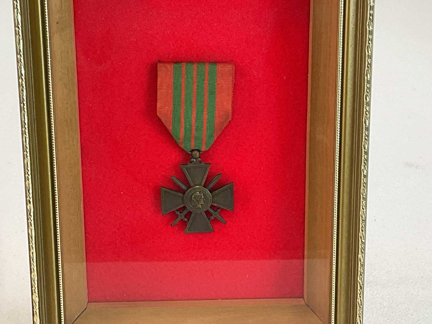A set of four re-issued WWII medals, framed and glazed, and a single restruck medal in a separate - Image 3 of 3
