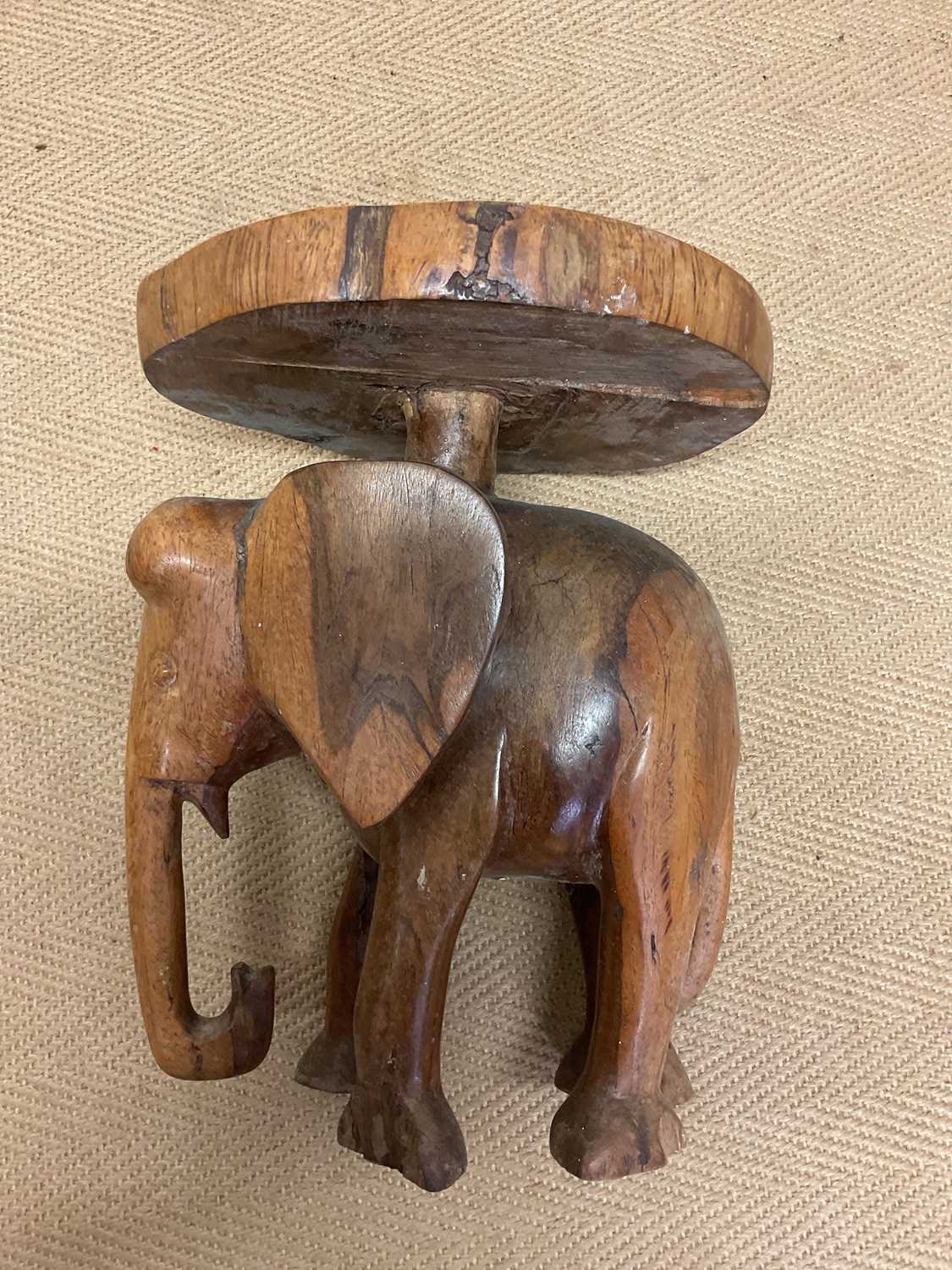A carved wooden elephant stand, height 39cm, diameter 30cm. - Image 4 of 5