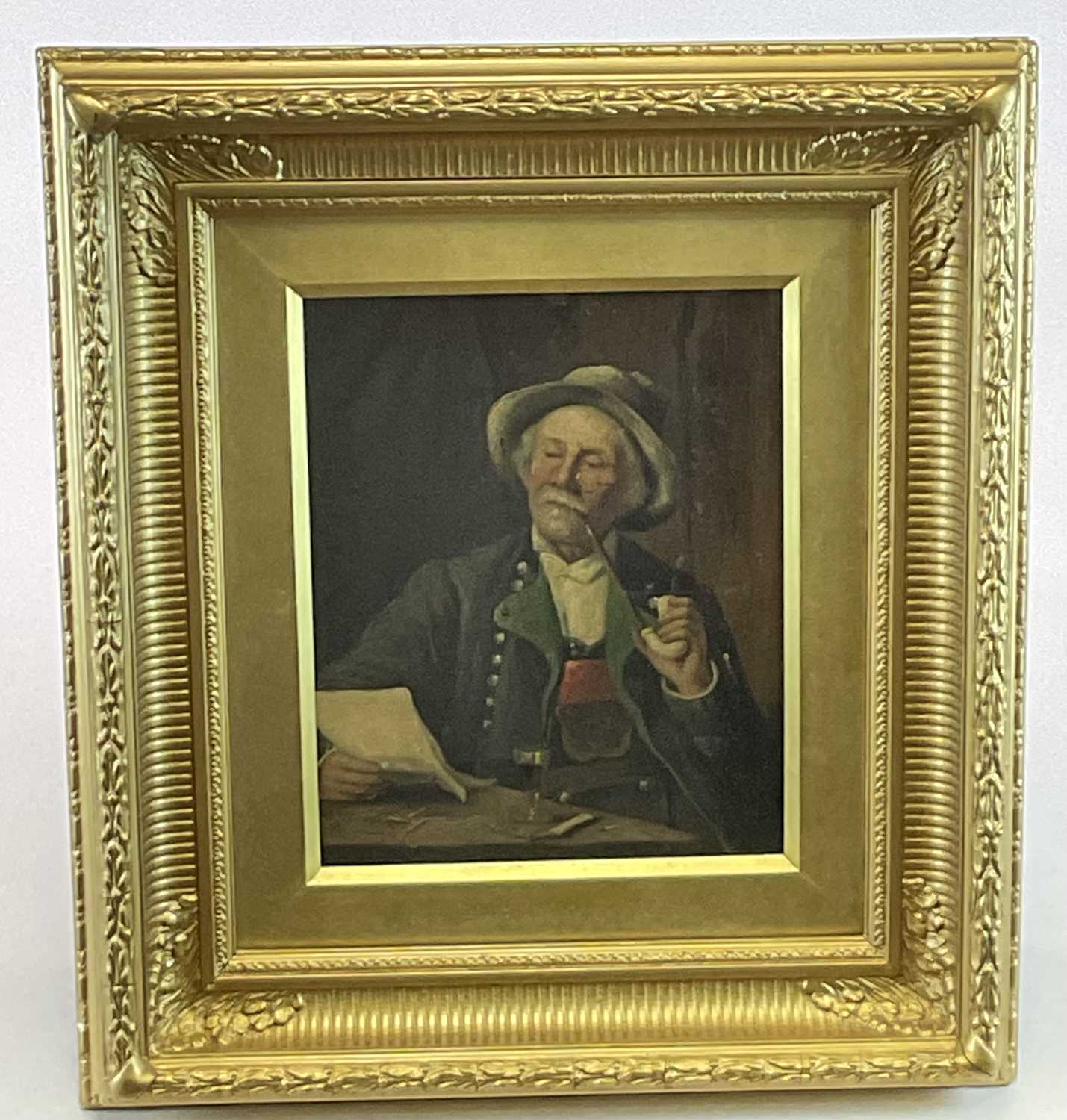 19TH CENTURY CONTINENTAL SCHOOL; oil on canvas, figure seated smoking a pipe reading a letter,