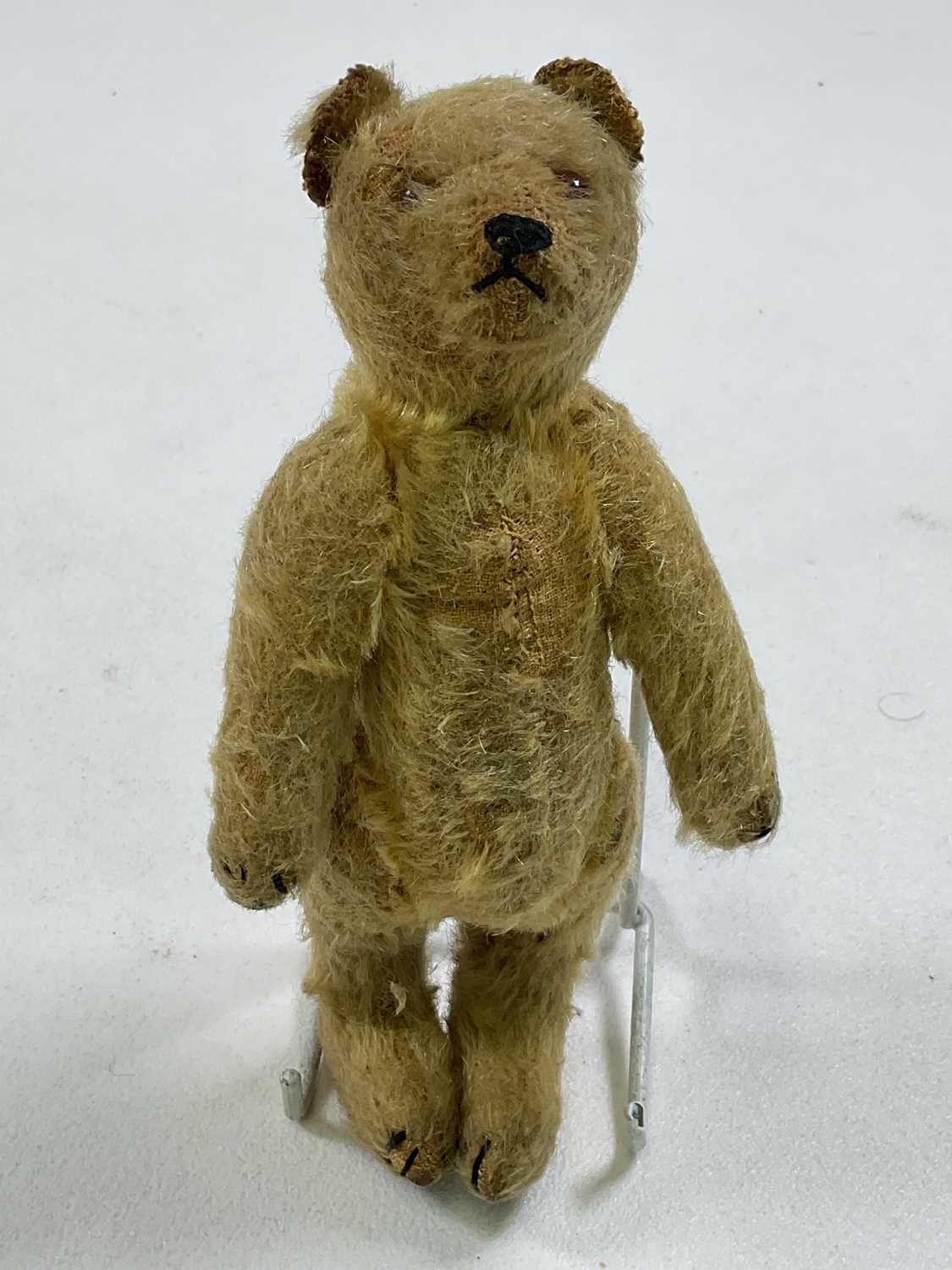 A small vintage mohair Teddy bear with glass eyes and a hump back, stitched nose, paws and feet, - Image 4 of 6